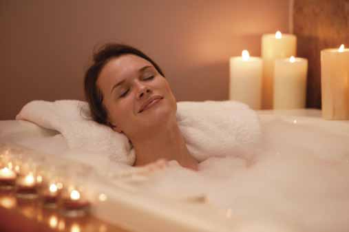 woman looking relaxed in bath